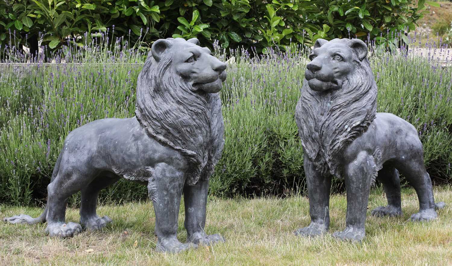 Pair of bronze standing lions
